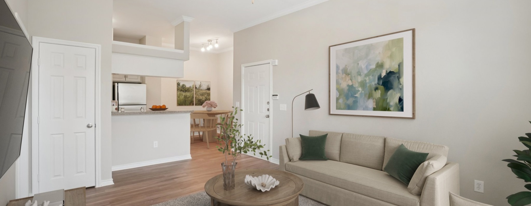 a living room with a couch and a table