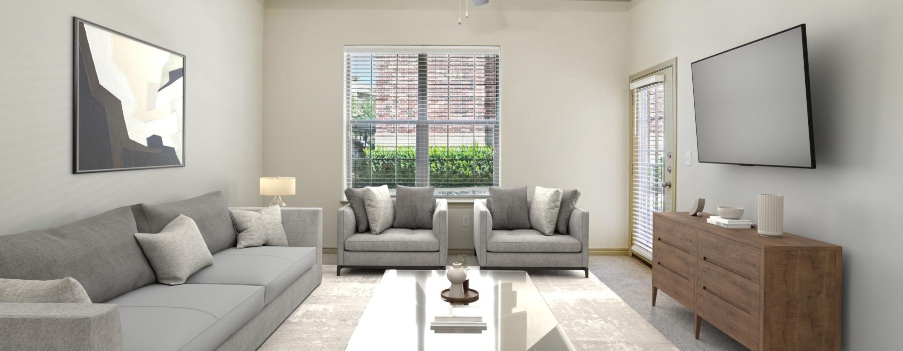 a living room with a couch and a table